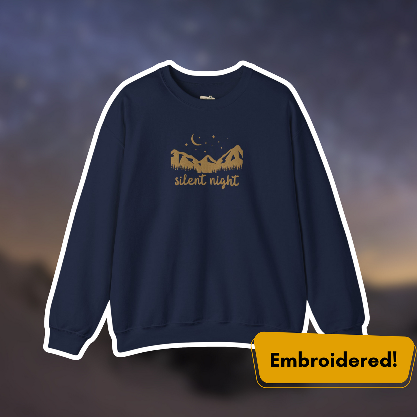 Silent Night Embroidered Crewneck in navy blue with gold mountain design and starlit sky, perfect for cozy winter evenings.