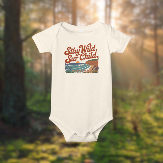Stay Wild Sur Child baby onesie featuring a colorful design, perfect for nature-loving infants.