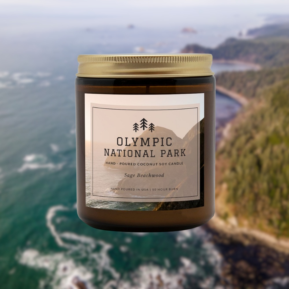 Olympic National Park Sage Beachwood CandleBring home the smell of the most beautiful places on earth, with these 9 oz coconut soy wax hand-poured National Park candles. These National Park Amber Jar Candles