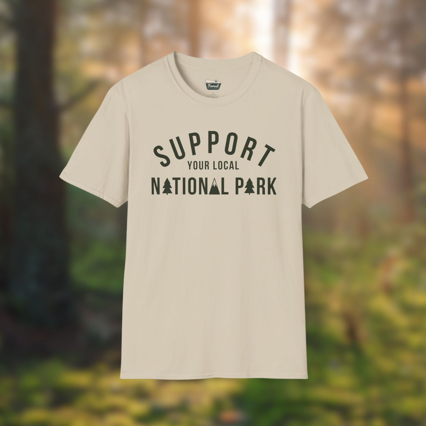Support Your Local National Park tee shirt in a scenic forest background, perfect for nature lovers and outdoor enthusiasts.
