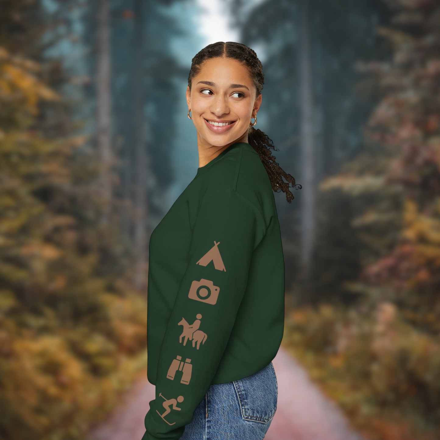 Adventure Ready Sleeves Crewneck Sweatshirt with national park icons against a forest background. Ideal for outdoor enthusiasts.