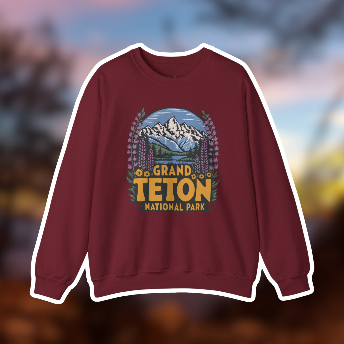 Grand Teton National Park Camp Crewneck Sweatshirt with vibrant wildflower design and iconic Teton Range illustration.