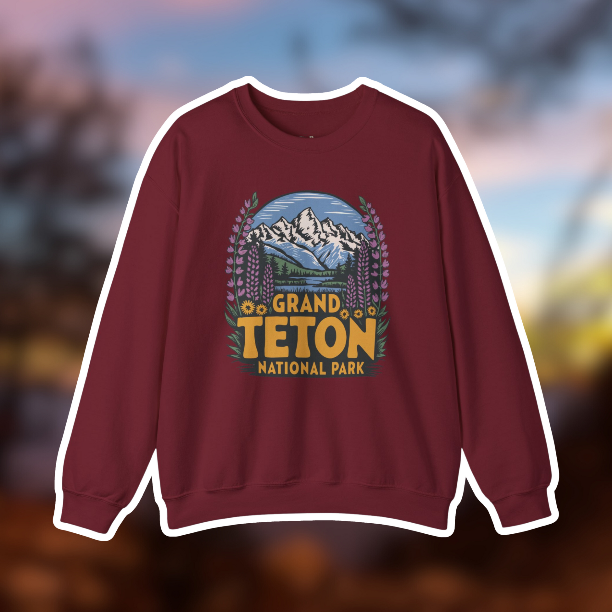 Grand Teton National Park Camp Crewneck Sweatshirt with vibrant wildflower design and iconic Teton Range illustration.