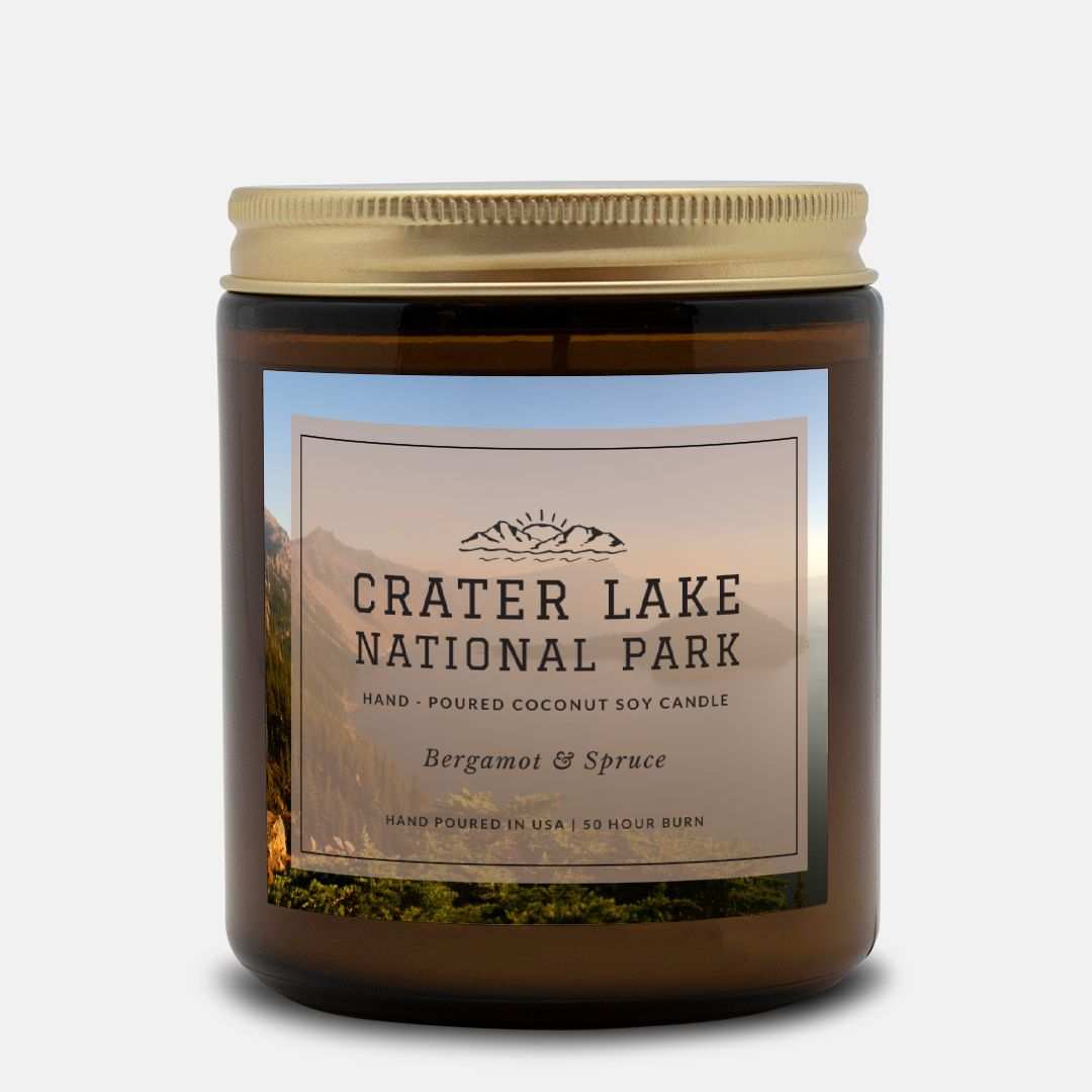 Crater Lake National Park Bergamot & Spruce CandleBring home the smell of the most beautiful places on earth, with these 9 oz coconut soy wax hand-poured National Park candles.
The Crater Lake candle scent has an he