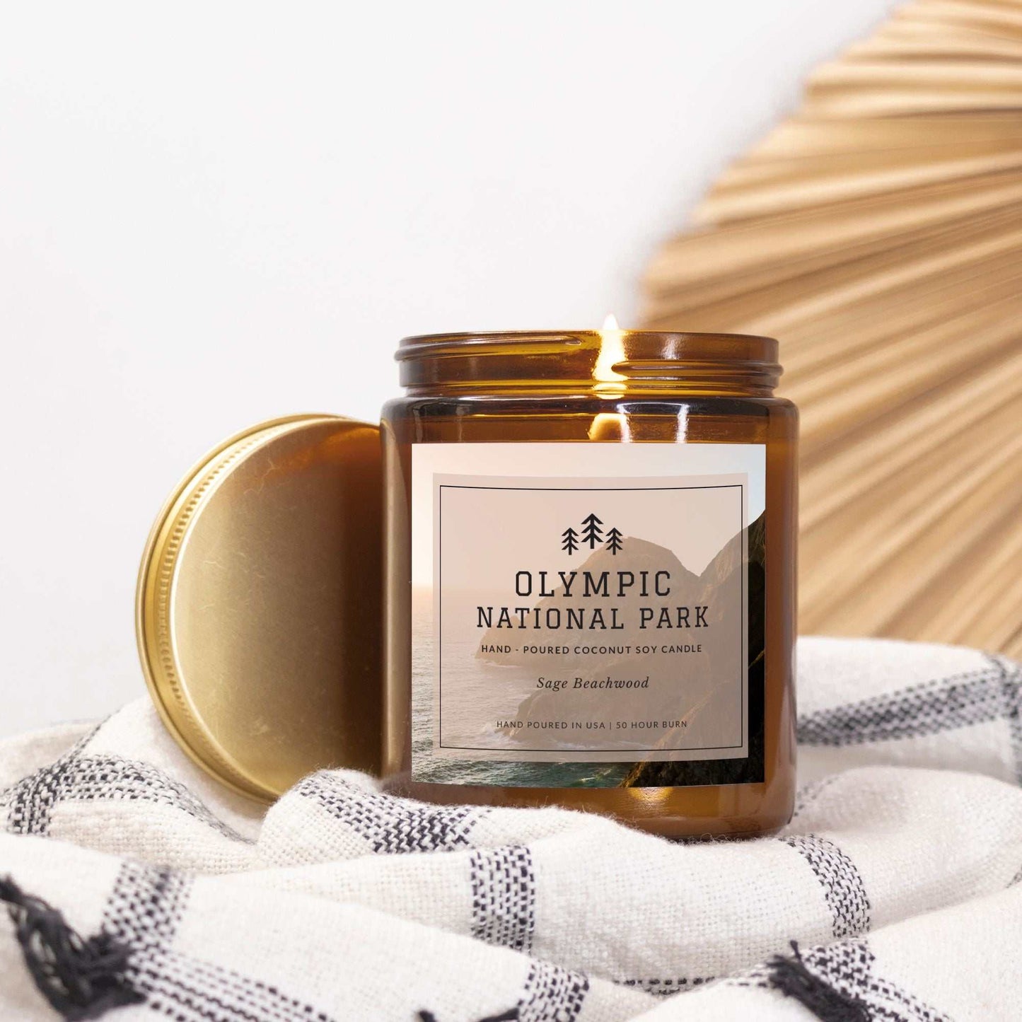 Olympic National Park Sage Beachwood CandleBring home the smell of the most beautiful places on earth, with these 9 oz coconut soy wax hand-poured National Park candles. These National Park Amber Jar Candles