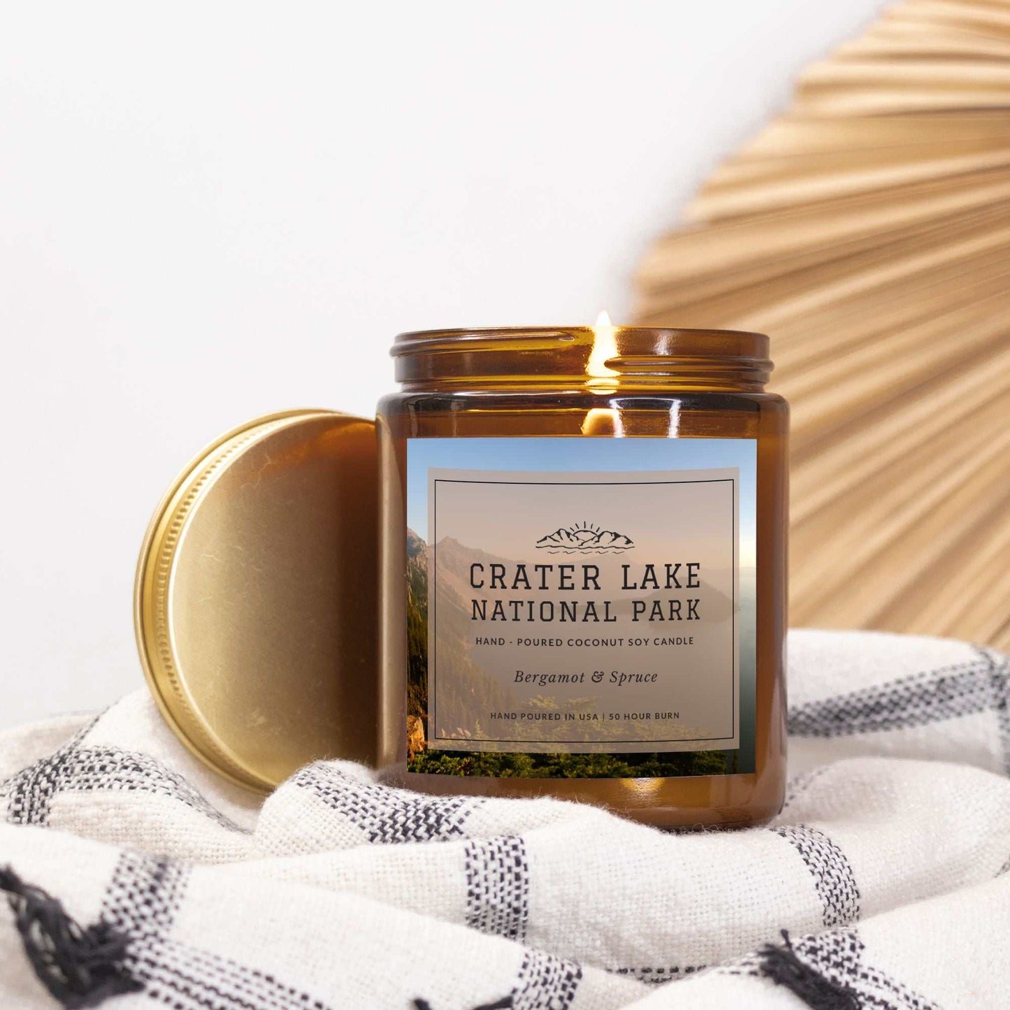 Crater Lake National Park Bergamot & Spruce CandleBring home the smell of the most beautiful places on earth, with these 9 oz coconut soy wax hand-poured National Park candles.
The Crater Lake candle scent has an he