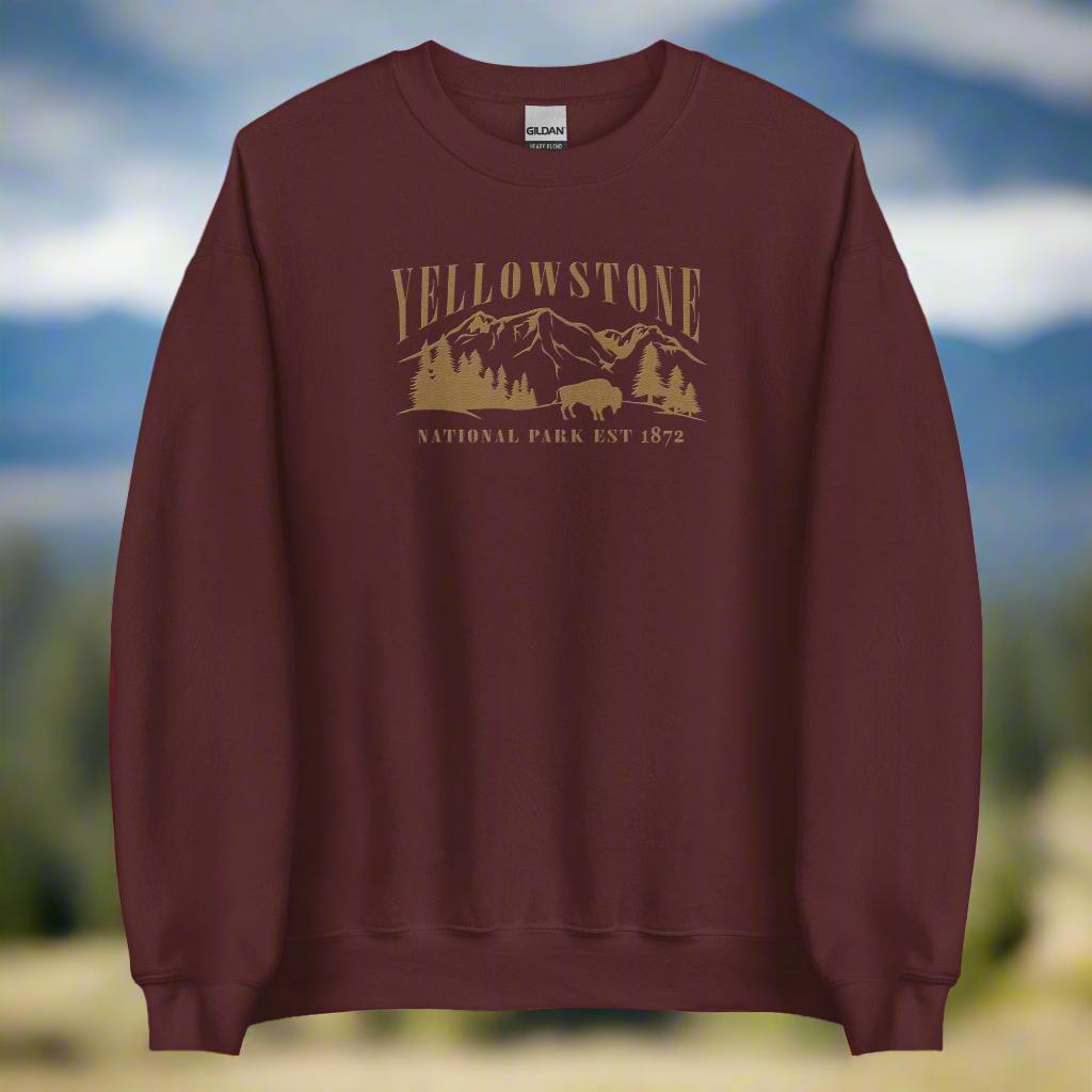 Yellowstone National Park Embroidered Crewneck SweatshirtBring the majesty of Yellowstone National Park into your wardrobe with this embroidered boyfriend crewneck sweatshirt inspired by the iconic Rocky Mountains and wild