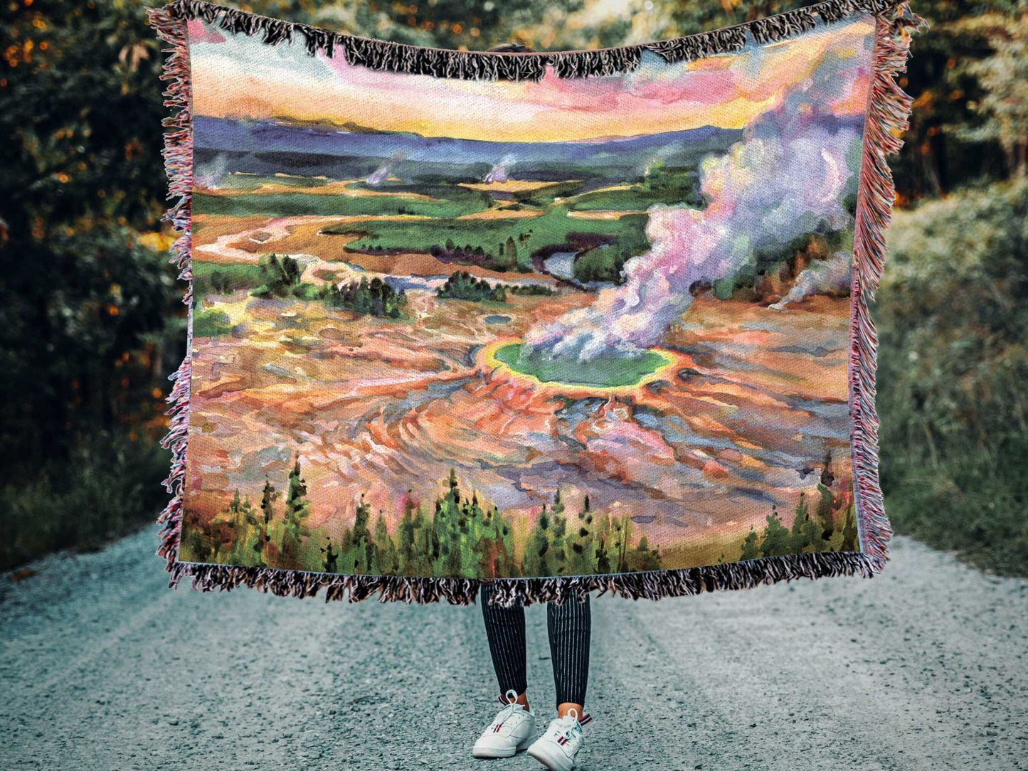 Yellowstone National Park Woven BlanketCozy up and remember all your favorite memories from your Yellowstone National Park adventures with this soft woven blanket featuring an original artist watercolor p