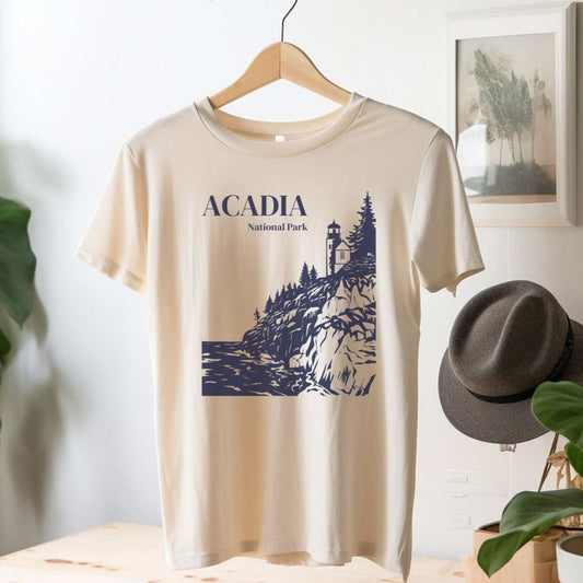 Acadia National Park Bar Harbor ShirtA classic Acadia National Park T-Shirt featuring the Bass Harbor Head Lighthouse landscape on the rocky New England Atlantic coastline.
Details:
- 100% jersey cotton