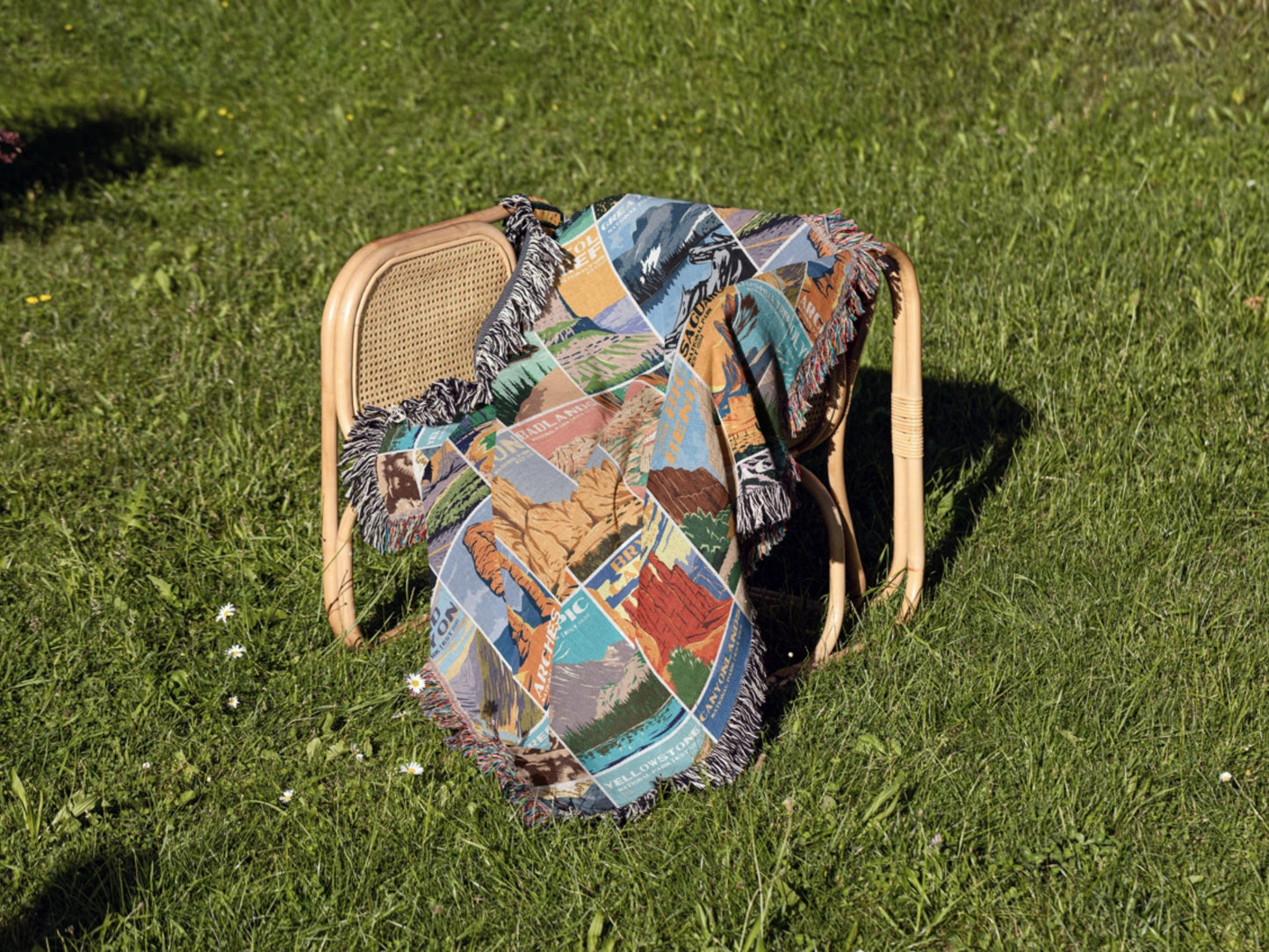 National Park Woven BlanketSnuggle up your little one with this National Park adventures baby blanket. Inspired by vintage National Park posters. The colors are gender neutral and a perfect ad
