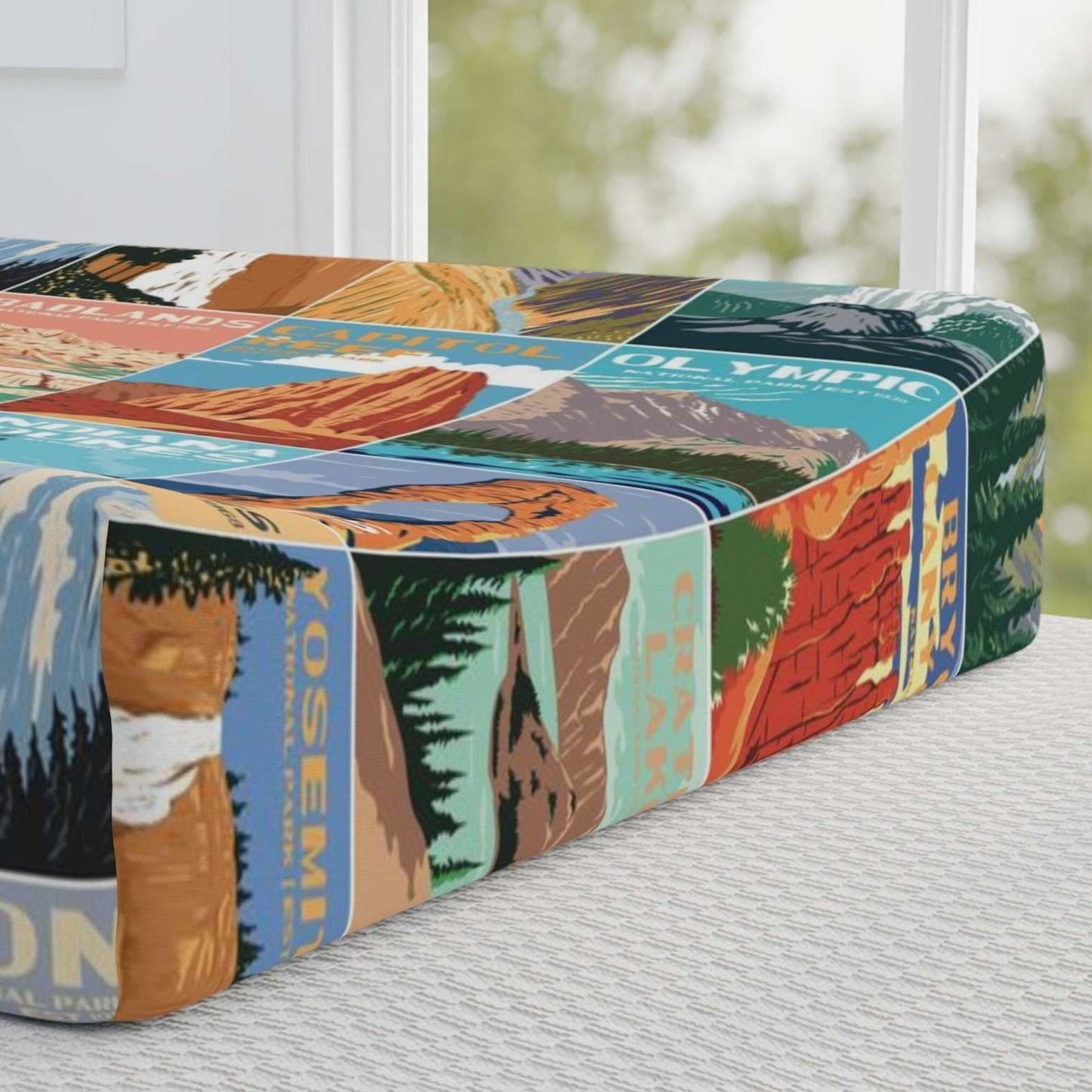 National Park Baby Changing Pad CoverComplete your National Park adventure themed nursery with this baby changing pad cover inspired by vintage National Park posters. The colors are gender neutral and a