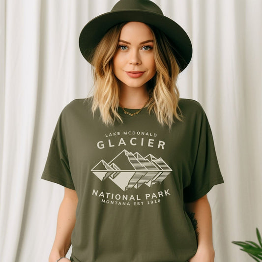 Glacier Lake McDonald National Park ShirtBring the beauty of Lake McDonald in Glacier National Park in the Rocky Mountains of Montana into your wardrobe with this ultrasoft and lightweight jersey cotton t-s