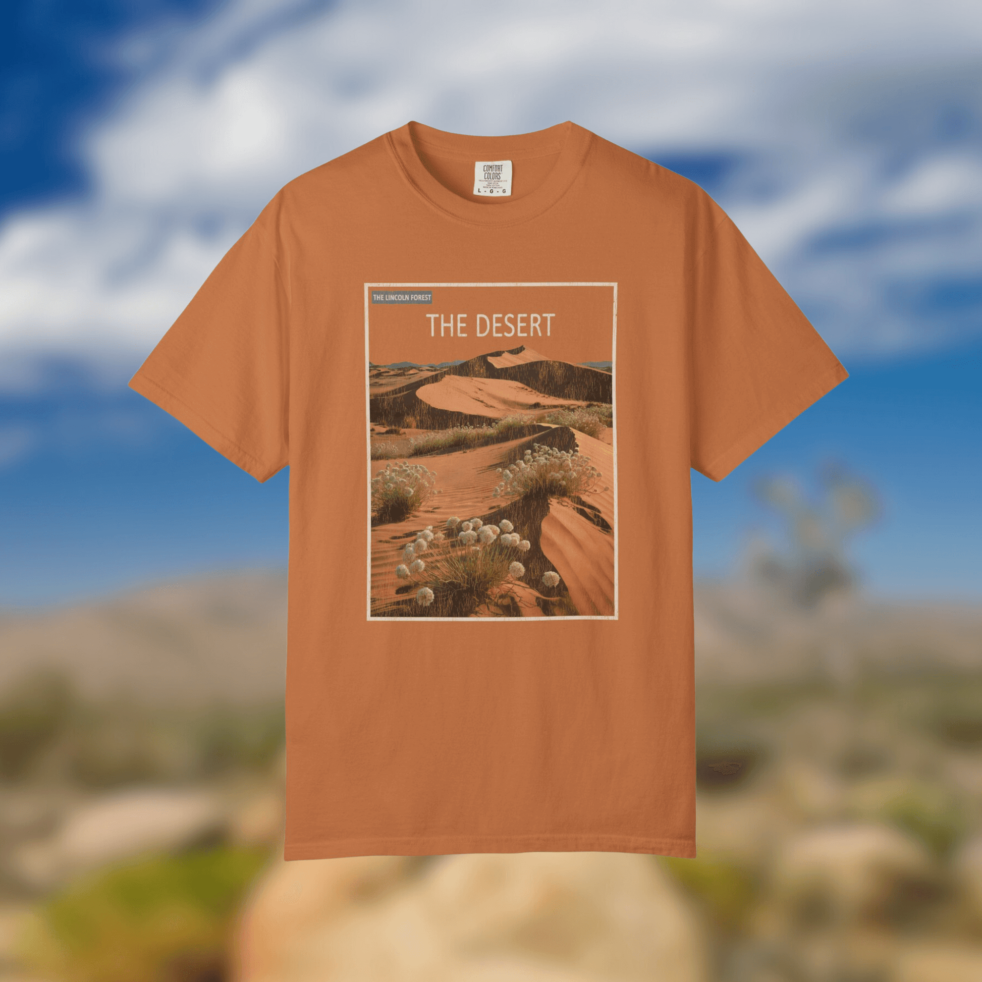The Desert Tee - Nature Library Series featuring a retro design with desert landscapes.