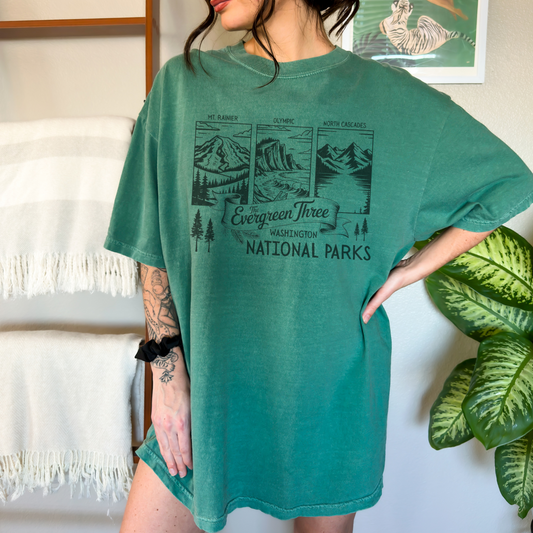 Washington Evergreen Three National Parks Tee featuring graphics of Mount Rainier, Olympic, and North Cascades.