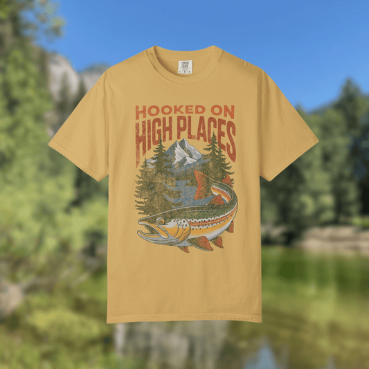 Trout adventure tee shirt featuring vintage design with mountains and trees, ideal for outdoor enthusiasts.