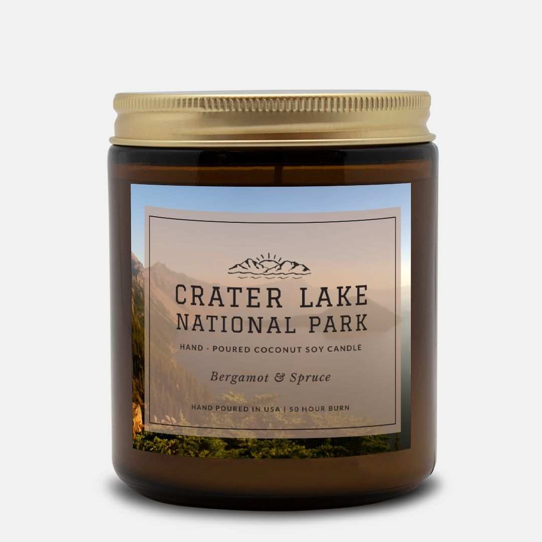 Crater Lake National Park Bergamot & Spruce CandleBring home the smell of the most beautiful places on earth, with these 9 oz coconut soy wax hand-poured National Park candles.
The Crater Lake candle scent has an he