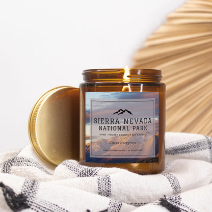 Sierra Nevada National Park Citrus Evergreen CandleBring home the smell of the most beautiful places on earth, with these 9 oz coconut soy wax hand-poured National Park candles. These National Park Amber Jar Candles 
