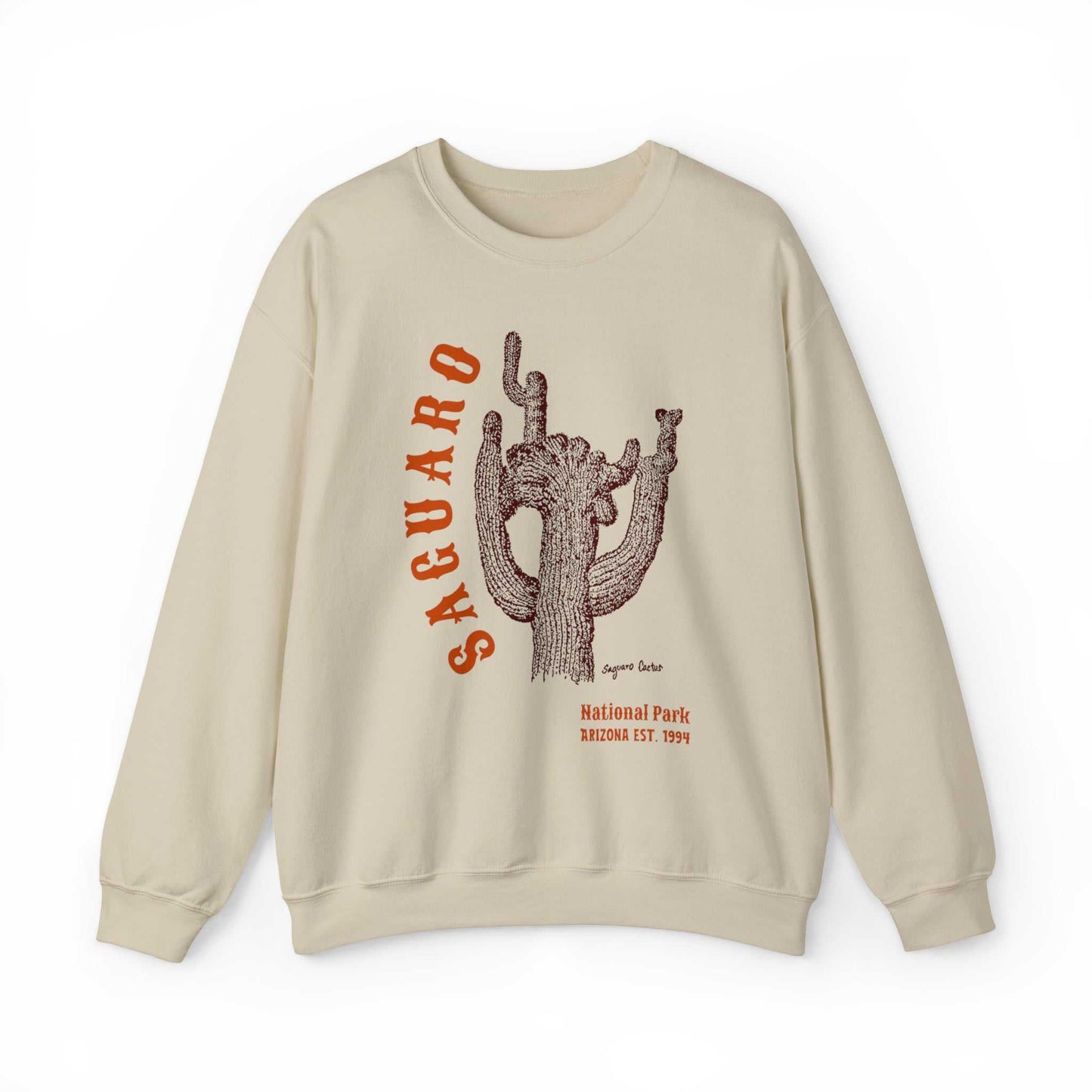 Saguaro National Park SweatshirtBring the beauty of Saguaro National Park into your wardrobe with this vintage styled crewneck sweatshirt or hoodie inspired by the magic of this iconic American Sou