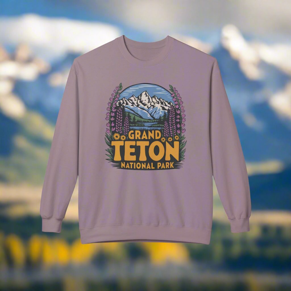 Grand Teton National Park Camp Crewneck sweatshirt featuring vibrant wildflowers and mountain illustration, perfect for outdoor adventures.