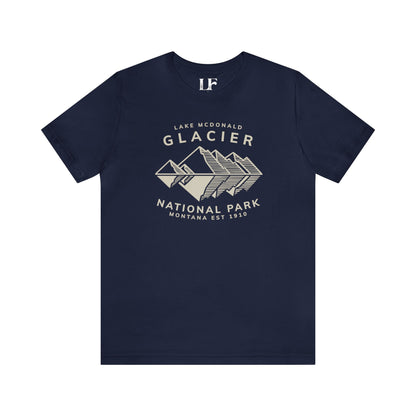 Glacier Lake McDonald National Park ShirtBring the beauty of Lake McDonald in Glacier National Park in the Rocky Mountains of Montana into your wardrobe with this ultrasoft and lightweight jersey cotton t-s