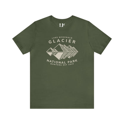 Glacier Lake McDonald National Park ShirtBring the beauty of Lake McDonald in Glacier National Park in the Rocky Mountains of Montana into your wardrobe with this ultrasoft and lightweight jersey cotton t-s