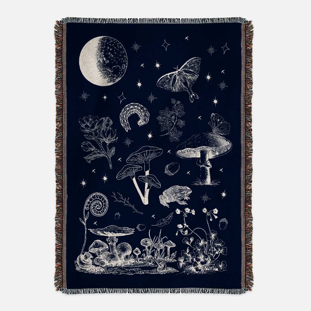 Mushroom Forest Woven BlanketBring the beauty and magic of the forest at night into your home with this mushroom forest blanket. Whether you're going for a forestcore, cottagecore, or granola gi