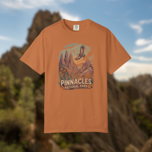 Pinnacles National Park Shirt featuring a graphic of mountains and a condor on a soft orange tee.