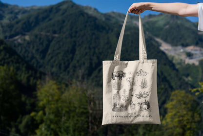 Yellowstone National Park ToteThese organic cotton tote bags feature the iconic flora and fauna of Yellowstone National Parkin the state of Wyoming.
Details:
- 15.75"h x 15.25"w - handle length o