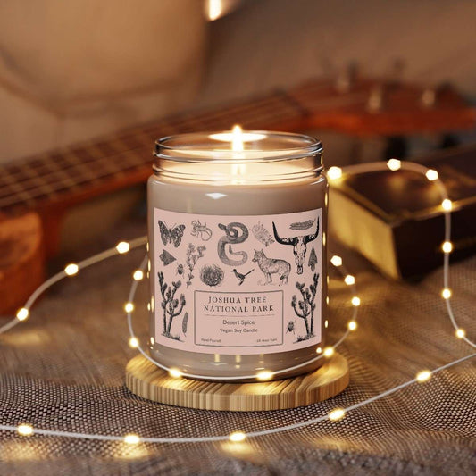 Joshua Tree National Park Hand-Poured Soy CandleThe Joshua Tree Desert Spice scented candle comes in 9 oz jars and brings the desert breeze and blooms of Joshua Tree National Park in Southern California into your 