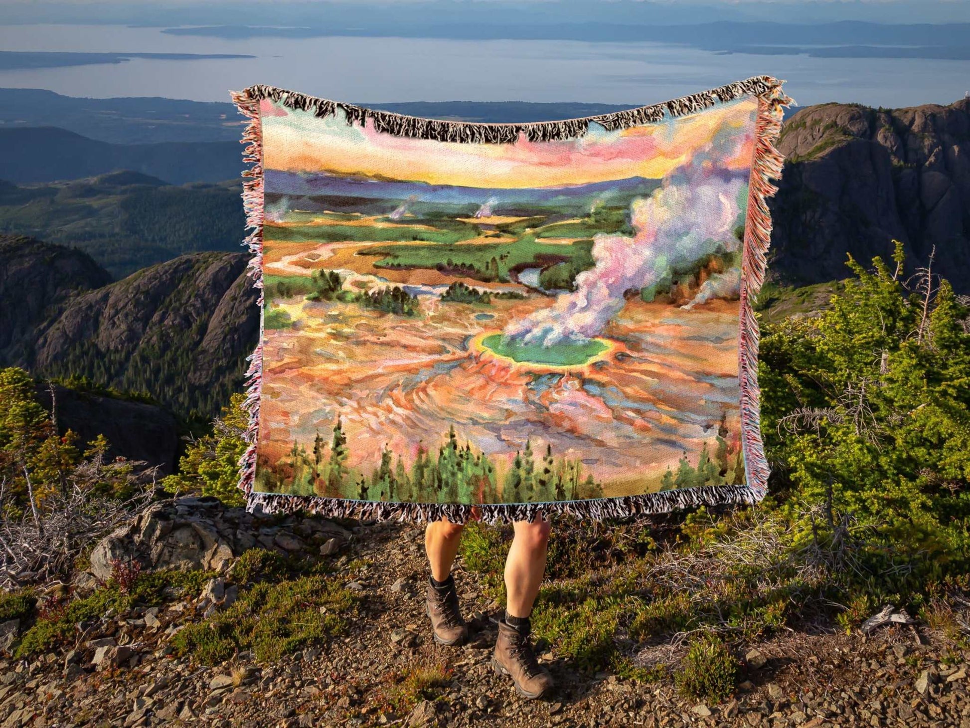 Yellowstone National Park Woven BlanketCozy up and remember all your favorite memories from your Yellowstone National Park adventures with this soft woven blanket featuring an original artist watercolor p