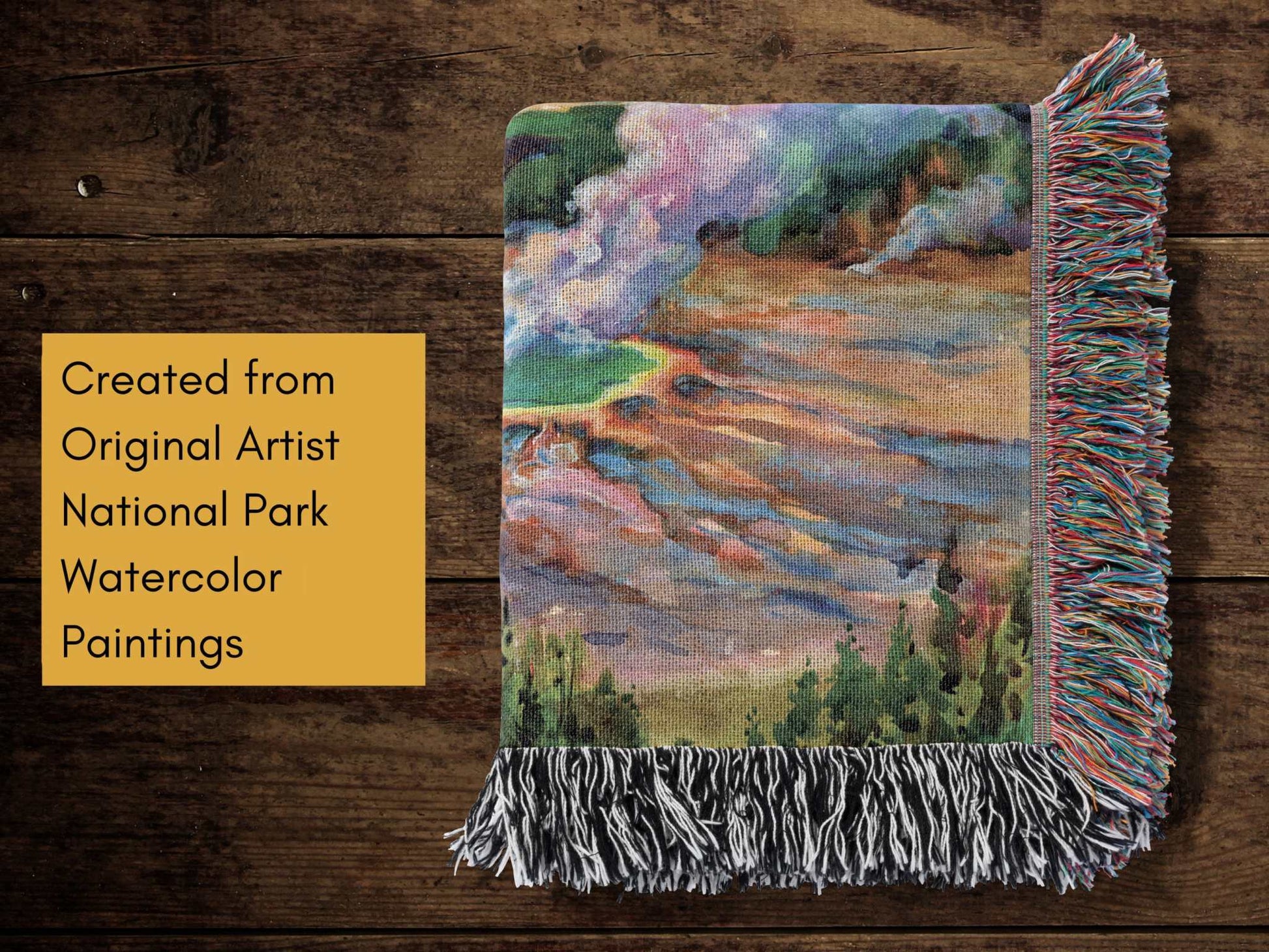 Yellowstone National Park Woven BlanketCozy up and remember all your favorite memories from your Yellowstone National Park adventures with this soft woven blanket featuring an original artist watercolor p