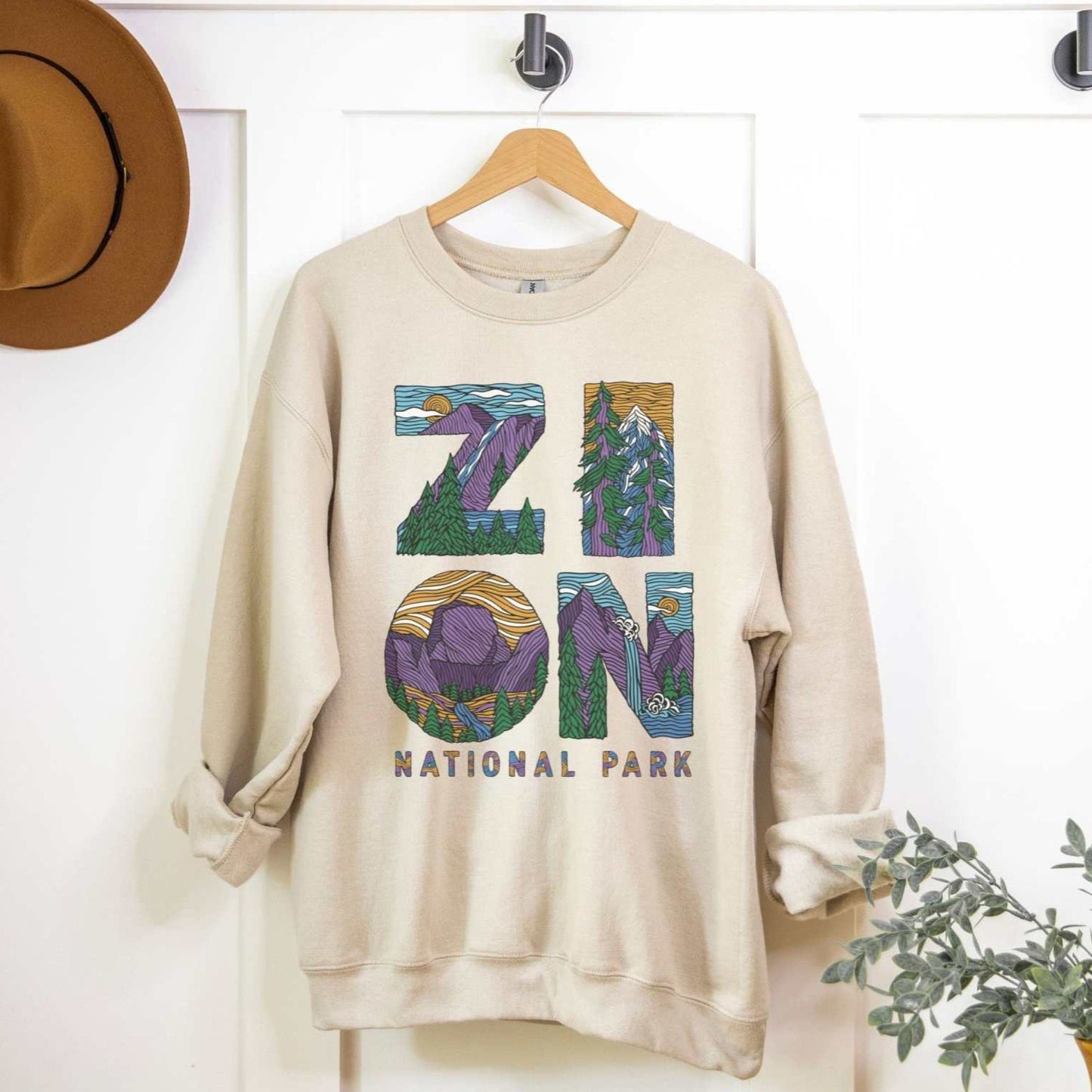 Zion Letters National Park SweatshirtBring back the vibe on your next outdoor outing with this adventure filled Zion National Park Sweatshirt.
- cotton blend - medium weight - unisex sizing
 
The Lincol
